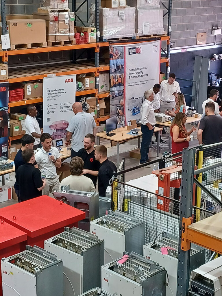Visitors networking with ABB, IDS and technology partners during the IDS Open Day 2026 engineering exhibition and live demonstrations.