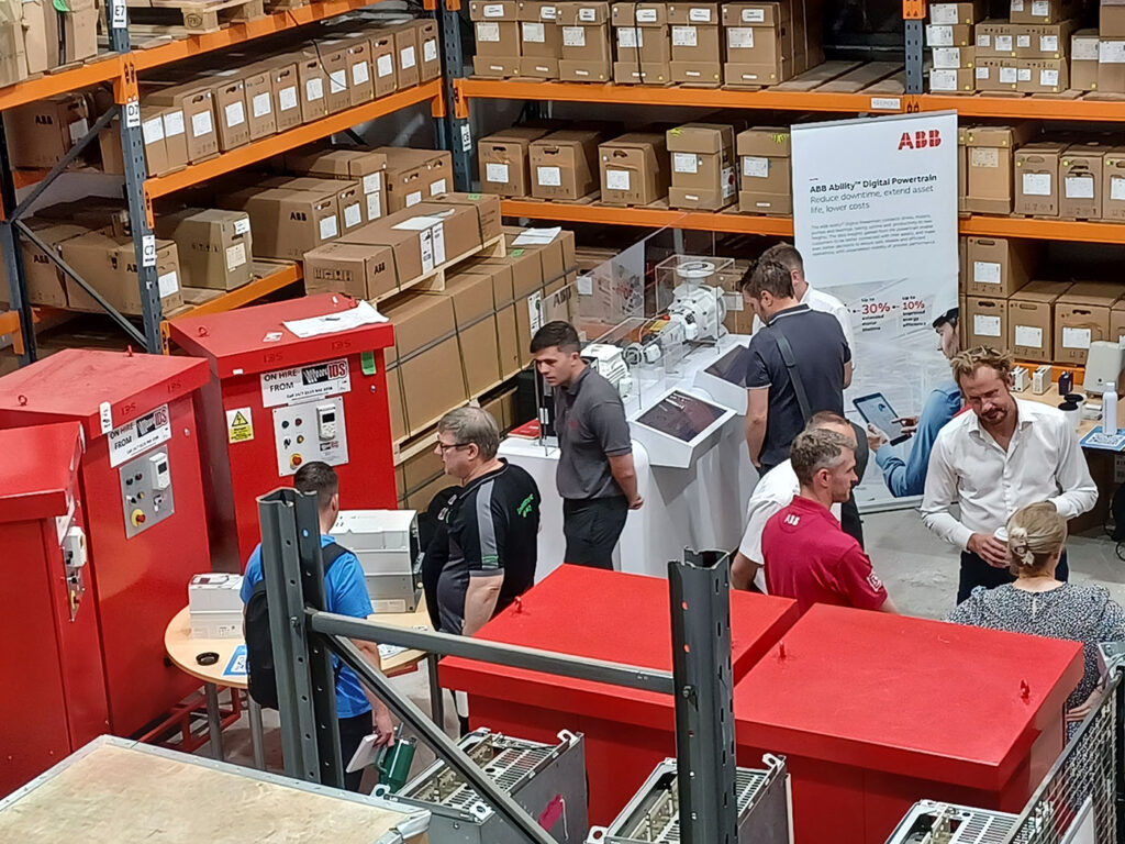 Visitors exploring ABB Digital Powertrain technology and networking with IDS engineers during the IDS Open Day 2026 engineering exhibition.