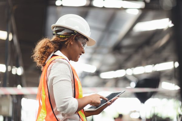 Complete Facilities Management Solutions from IDS this picture shows a lady in a high viz and hard hat