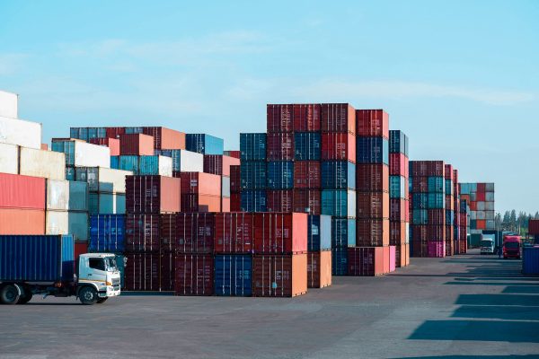 Transport and Logistics Solutions from IDS this imnage shows shipping containers and a lorry
